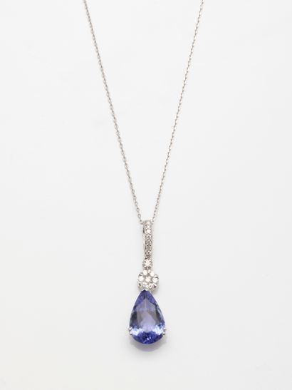 null 18k white gold drop pendant set with a 3.85cts pear cut tanzanite topped with...