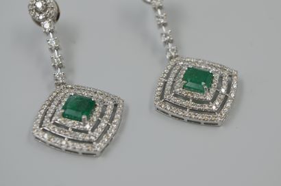 null Pair of 18k white gold earrings with openwork quadrangular design entirely set...
