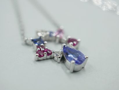 null 18k white gold necklace set with a pear-cut tanzanite surmounted by an openwork...