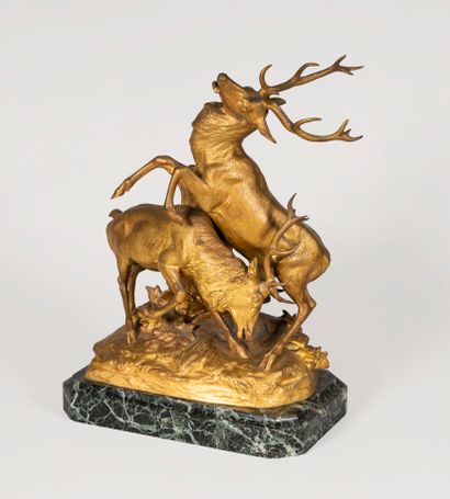 null Georges GARDET (1863-1939) 
Combat de Cerfs 
Sculpture en bronze doré, signée...