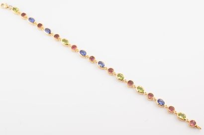 null Bracelet souple en vermeil orné de tanzanites, tourmalines roses et péridots....