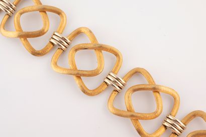 null Bracelet souple articulé en or jaune 18k à motifs triangulaires entrelacés en...