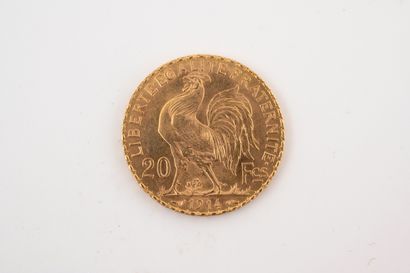 null Pièce 20 francs or jaune 18k, datée 1914. 
Poids : 6,40gr