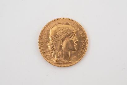 null Pièce 20 francs or jaune 18k, datée 1914. 
Poids : 6,40gr