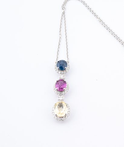 null Trilogy necklace in 18k white gold holding a pendant set with three blue, pink...