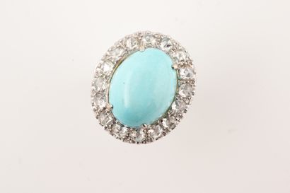 null Important oval ring in 18k white gold with a synthetic turquoise cabochon in...