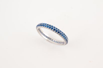 null Ring in 18k white gold set with two lines of synthetic sapphires. 
Gross weight:...