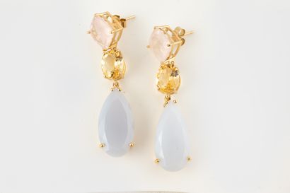 null Pair of silver earrings set with square rose quartz, oval citrine holding a...