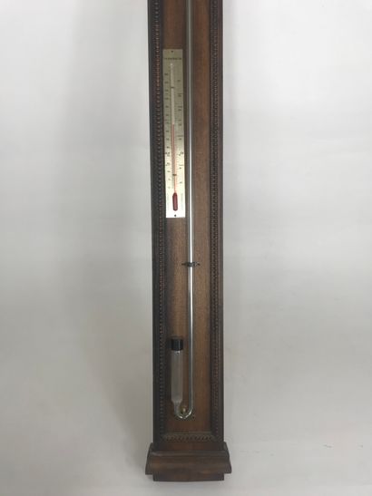 null Barometer-thermometer with mercury on a natural wood blade decorated with a...