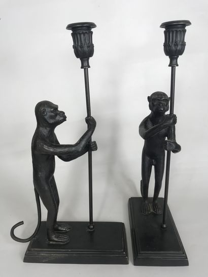null French school XXth century 
Pair of candlesticks featuring monkeys holding torches...