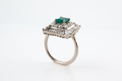 null Square ring in 18k white gold, centered on an emerald-cut emerald in a double...