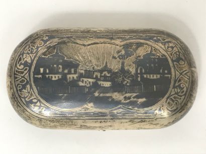 null Oval silver snuffbox with guilloche decoration on one side and an urban landscape...