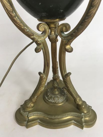 null Old oil lamp with two patinas, in gilded bronze and blackened brass decorated...