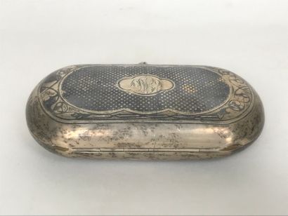 null Oval silver snuffbox with guilloche decoration on one side and an urban landscape...