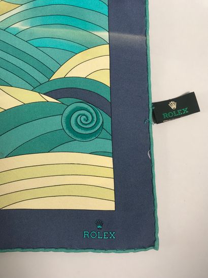 null ROLEX.
Silk square with stylized waves, green background and blue borders (stains,...
