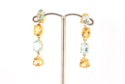 null Pair of gilded silver (vermeil) earrings clawed with blue topazes and citrines....