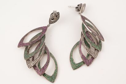 null Pair of silver earrings decorated with openwork leaves set with rubies, diamonds...