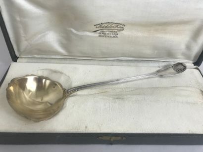 null OLIER and CARON 
Cream spoon in silver and spoon in vermeil. Decorated with...