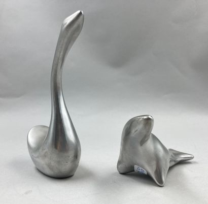 null Two paperweights in stainless steel, representing stylized animals. Signatures...