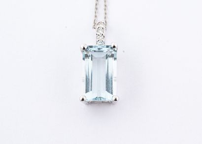 null Pendant set with a 2ct emerald cut aquamarine and diamonds on the hanger. With...