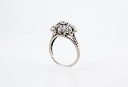 null 18k white gold flower ring centered with a 0.45ct brilliant cut diamond, the...