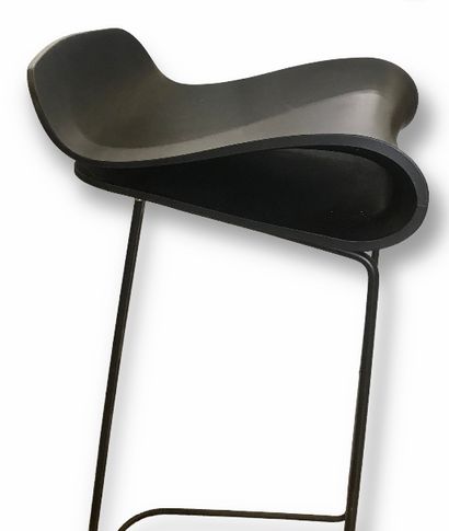 null Design bar chair with thermoformed plastic seat and black lacquered metal base....