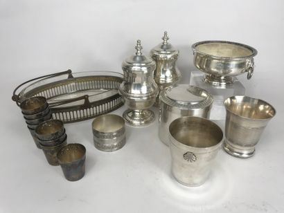 null Lot in silver plated metal including a covered box and a ring of napkin with...
