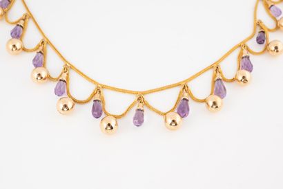 null Modern drapery necklace in 18k yellow gold decorated with festoons of gold beads...