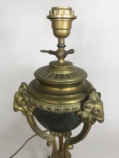 null Old oil lamp with two patinas, in gilded bronze and blackened brass decorated...