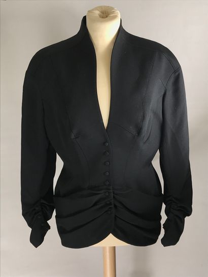 null THIERRY MUGLER, Vintage
Black worsted wool jacket. Size 40.
(Condition of u...