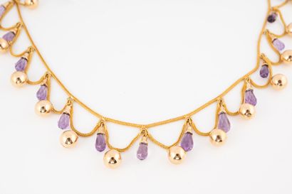 null Modern drapery necklace in 18k yellow gold decorated with festoons of gold beads...
