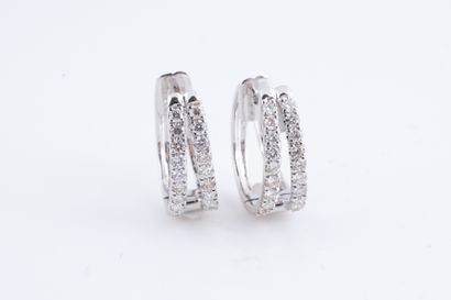 null Pair of 18k white gold hoop earrings set with a double line of diamonds.
Total...