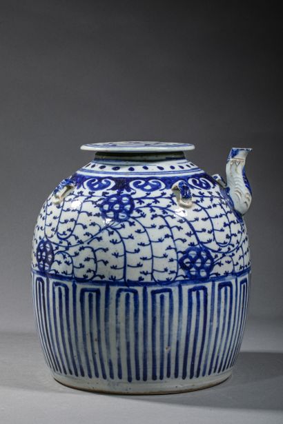 null CHINA , XIXth century
Large covered stoneware coffee pot, white and blue enameled....