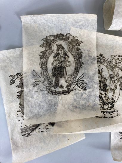 null CHINA.
Lot of prints on rice paper representing buddhist themes, dragons and...