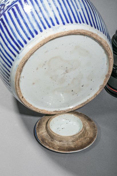 null CHINA , XIXth century
Large covered stoneware coffee pot, white and blue enameled....
