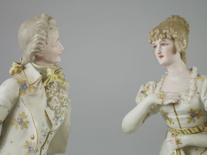 null Couple in polychrome and gilded porcelain cookie. 
Mark under the base. 
Height:...