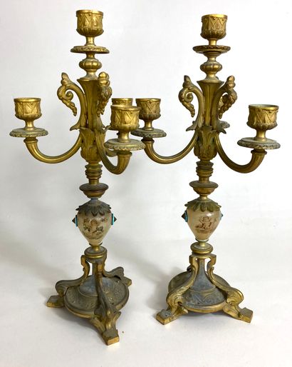 null Pair of gilt bronze candelabras with four arms of light. Element of the shaft...