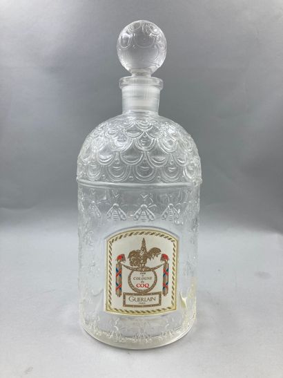null GUERLAIN "Eau de Cologne du Coq
Glass bottle, colorless bees model. Empty, titled...