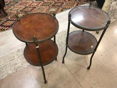 null Pair of small pedestal tables with two circular wooden trays, covered with leather...