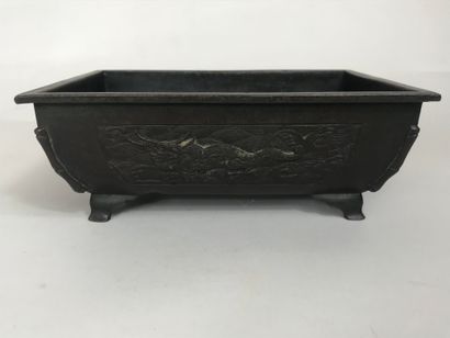 null CHINA, circa 1900
Patinated bronze incense burner of rectangular section with...