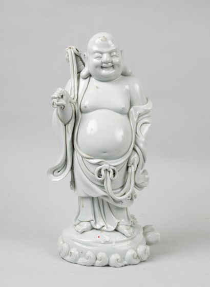 null CHINA late 19th, early 20th century
Pu Taï standing on the waves.
China white.
Height...