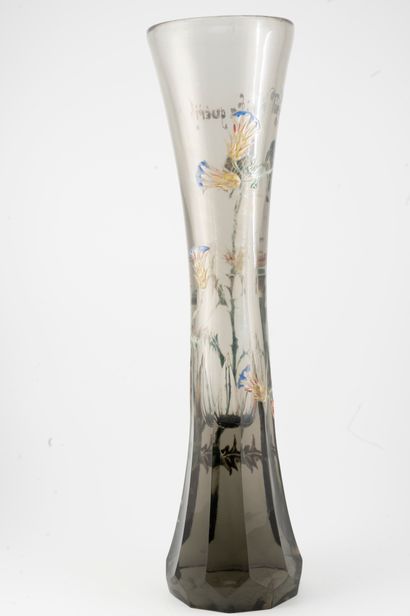null Émile GALLE (1846-1904)
Talking glassware
A diabolo-shaped soliflore vase with...