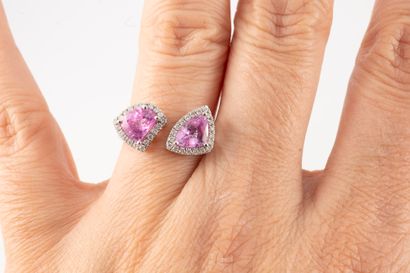 null Original Vous Moi ring in 18k white gold set with faceted pink sapphires surrounded...