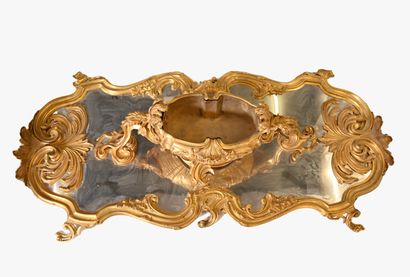 null A very important table with scrolled edges and a central jardinière in gilt...