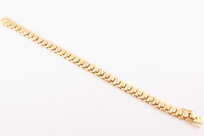 null 18k yellow gold snake chain bracelet set with 19 diamonds totaling approx. 1.50ct....