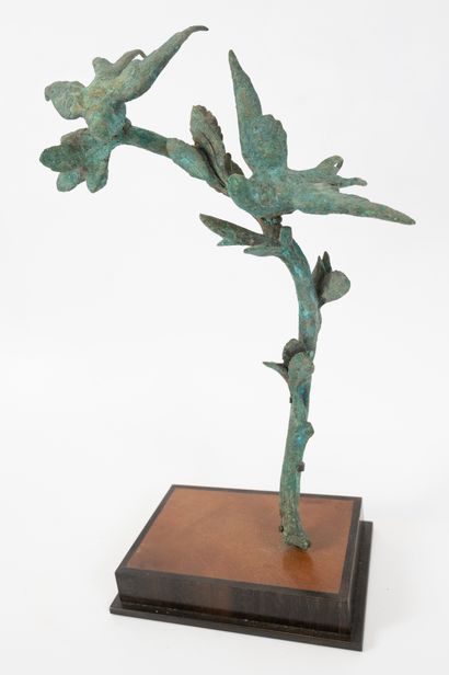 null Bronze decorative element featuring two swallows on a leafy branch.
Height:...