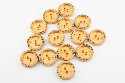 null SONIA RYKIEL
Ensemble de 14 boutons en métal façon bronze signés. 
Diam.: 1...