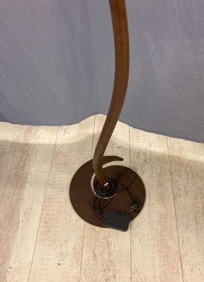 null Large movement-shaped lamp in rust-colored metal, glass shade. 
20th century...