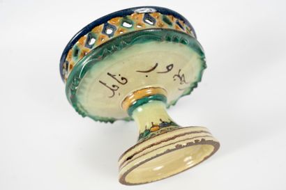 null NABEUL polychrome ceramic bowl on pedestal. 
Signed in Arabic script (Madjoub...