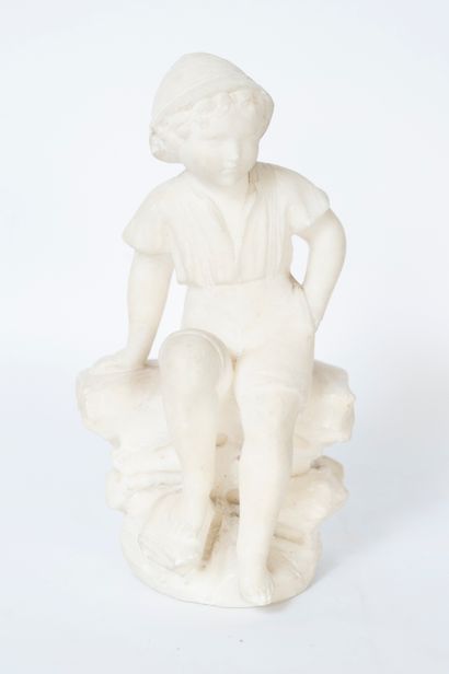 null BUCHOT(?) 
Young boy sitting on rocks.
Marble subject (composite?) signed on...